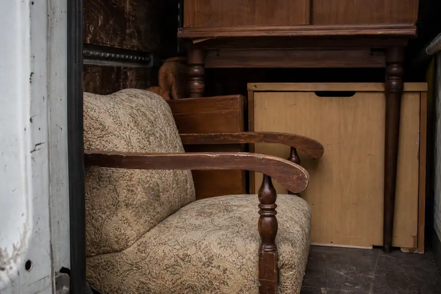 Donated furniture into a charity van