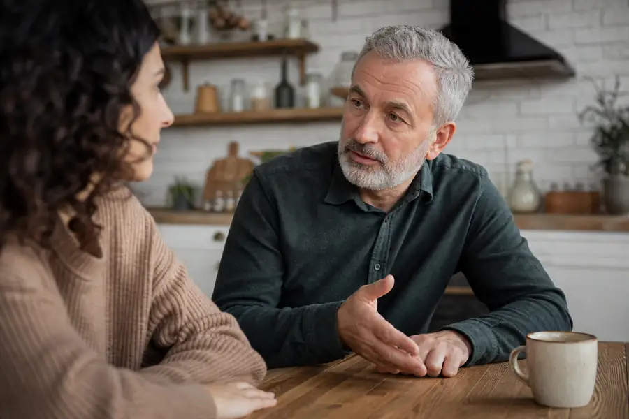 Calm conversation at a kitchen table