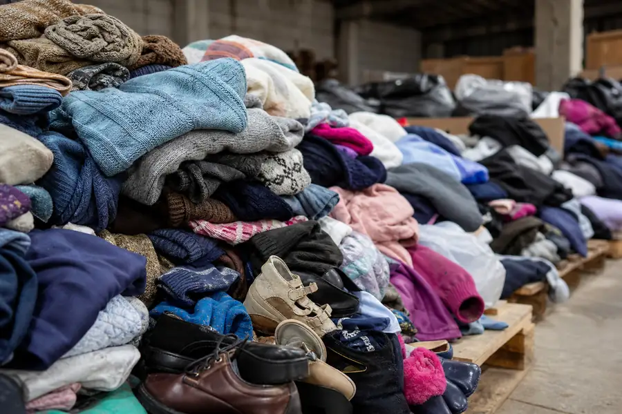 Warehouse with sorted piles of donations